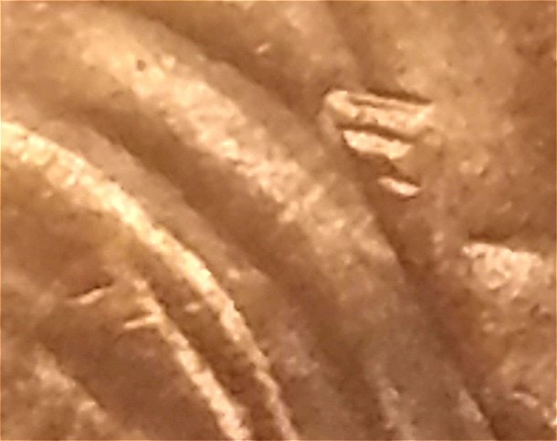 1999-D-Lincoln-Cent-Unusual-Extra-Die-Strikes-On-Bust-Of-Obverse?